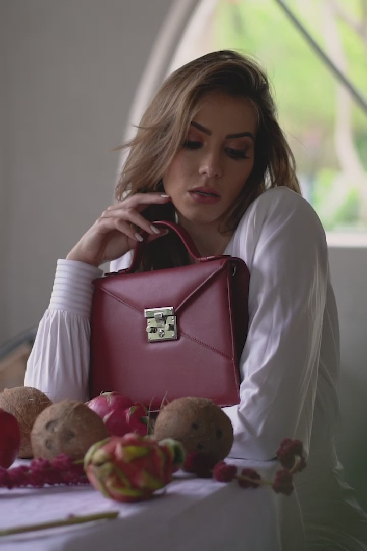 LOURDES 1974 Red handbag video with a model