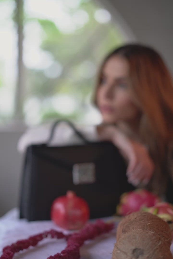 LOURDES 1974 Black handbag video with a model